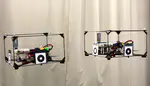 ModQuad-Vi: A vision-based self-assembling modular quadrotor